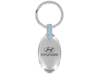 Hyundai Oval shape keychain with 4 blue crystals 00402-21110
